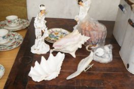 Two oriental figures, shells, lamp and others