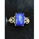 9ct Gold ring set with large blue hard stone weigh
