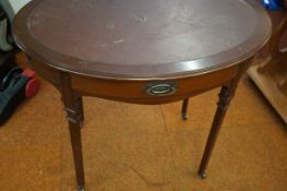 Edwardian drawer side table on brass casters