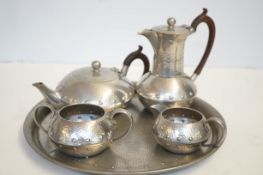 Hammered pewter service with matching tray