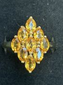 9ct Gold ring set with 9 citrine stones Weight 4g