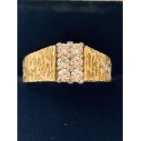 18ct gold ring set with 6 round cut diamonds, tota