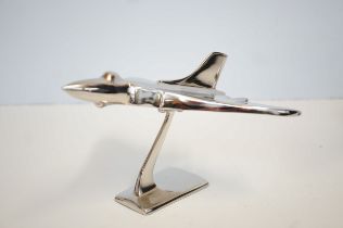 Chrome Vulcan bomber on stand