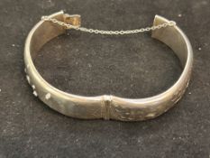 Silver bangle (some bruising) 25 grams with safety