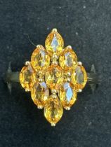 9ct Gold ring set with 9 citrine stones Weight 4g