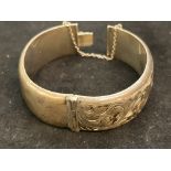 Silver bangle (some bruising) 35 grams with safety