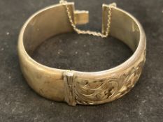 Silver bangle (some bruising) 35 grams with safety
