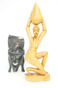 African carved figure together with ebonised woode