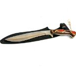 Hunting knife with tooled sheath