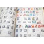 A large World stamp album containing a collection