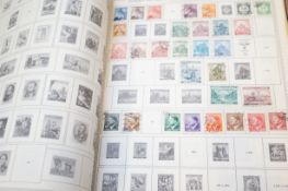 A large World stamp album containing a collection