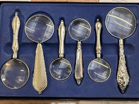 Silver plated magnifying glasses