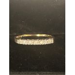 9ct gold ring set with 7 diamonds Size S 1.7 grams