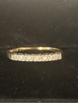 9ct gold ring set with 7 diamonds Size S 1.7 grams