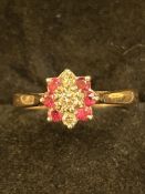 18ct Gold ring set with 3 diamonds & 6 rubies Size