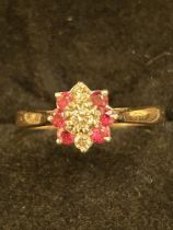 18ct Gold ring set with 3 diamonds & 6 rubies Size