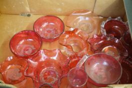 Box of Victorian cranberry glass