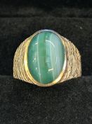 9ct Gold gents ring set with large hard stone Weig