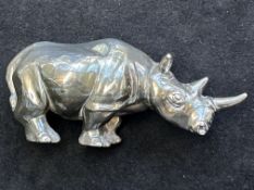 Silver Rhino stamped on foot