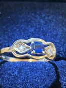 18ct Gold ring set with sapphire & 2 diamonds Size