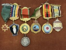 Collection of medals to include 1 silver
