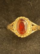 9ct gold ring set with large garnet Size M