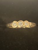 9ct gold ring set with 3 diamonds Size I 1.8 grams