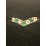 9ct gold wishbone ring set with green stones and C