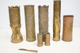 Collection of WWI trench art shells