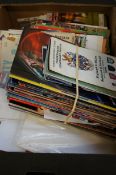 Large collection of unsorted football programs