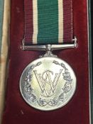 Woman's voluntary service medal