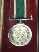 Woman's voluntary service medal