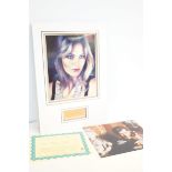 Brit Ekland autograph together with a signed photograph of Rodger Moor