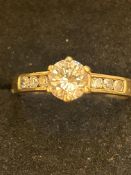 9ct gold ring set with solitaire white stone and 3