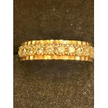 9ct gold full eternity ring set with white stones