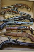 Collection of 7 replica pistols to include a powde
