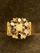 9ct Gold cluster ring set with sapphires & diamond