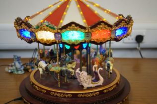 Large revolving christmas carousel in full working