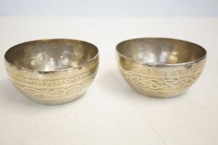 Pair of low grade silver oriental mixing bowls