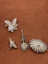 4 Silver brooches