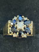 9ct Gold ring set with 7 diamonds & 6 sapphires Si