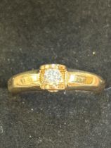 9ct Gold ring set with single solitaire white ston