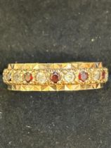 9ct Gold full eternity ring set with garnets & whi