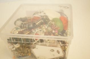 Unsorted box of costume jewellery