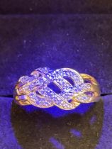 9ct Gold crossover ring set with diamonds Size O 2