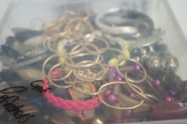 Unsorted box of costume jewellery