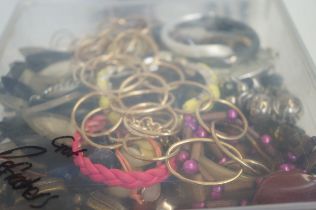 Unsorted box of costume jewellery