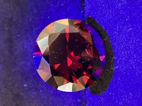 22ct conical ruby red garnet round cut - no coa