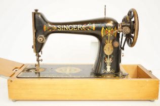 Singer sewing machine with foot pedal