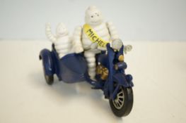 Cast iron Michelin man & sidecar motor bike